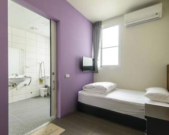 Travelers Plus - צ'יאי - חדר שינה