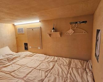 Travel Light Hostel - Busán - Habitación