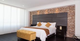 Hotel Varuna - מאניזאלס - חדר שינה