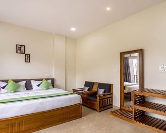 Treebo The Rove with Swimming Pool - Madikeri - Slaapkamer