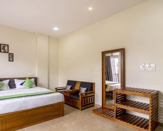 Treebo The Rove with Swimming Pool - Madikeri - Slaapkamer