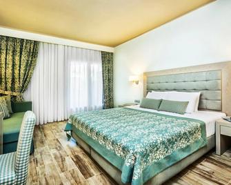 Xenios Anastasia Resort & Spa - Nea Skioni - Schlafzimmer