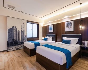 Oufeidun Hotel (Shenzhen Gongming Square Honghuashan Park Branch) - Shenzhen - Camera da letto