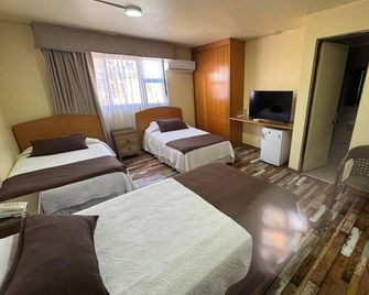Hotel Cano - Іквуікве - Спальня