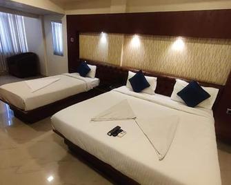 Hotel Adya Classsic - Chandapura - Habitación