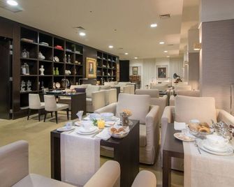 Universal boutique Hotel - פיגרה דה פוז - מסעדה