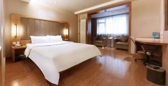 JI Hotel Urumqi Youhao Branch - Ürümqi - Bedroom