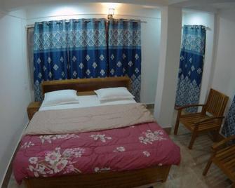 Mountain Mist Resort - Tawang - Sypialnia
