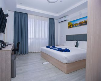 Barth Hotel Apartments - Dodoma - Habitación