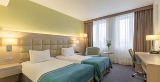 Nesterov Plaza Hotel - אופה - חדר שינה