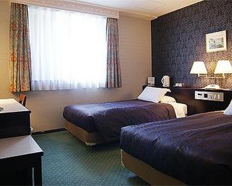 Kurume Station Hotel - Kurume - Bedroom