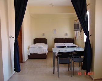 Sun Apart Motel - Ozdere - Schlafzimmer