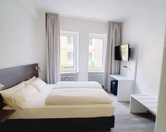 Zimmervermietung Sanderstrasse - Wurzburg - Soveværelse