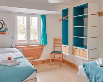 Twin Room 5 - turquoise - Holiday on the organic farm - Schwerin - Habitación