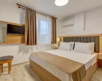 Barbun Pansiyon - Mordoğan - Habitación