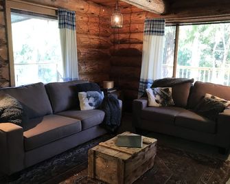 The Enchanted Woods Waterfront Log Cabin at Secret Cove - Halfmoon Bay - Living room