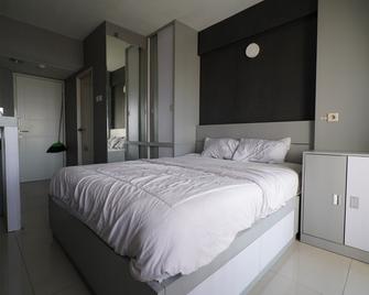 OYO 93366 Apartement Grand Sentraland By Rai Property - Karawang - Kamar Tidur