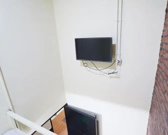 Kamar Keluarga Tanjung Priok - ג'קרטה - נוחות החדר