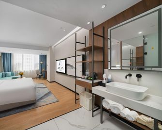 Ufun Light Hotel (Yulin International Convention And Exhibition Center Yuntian Cultural City) - Yulin - Habitación