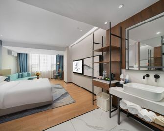 Ufun Light Hotel (Yulin International Convention And Exhibition Center Yuntian Cultural City) - Yulin - Habitación