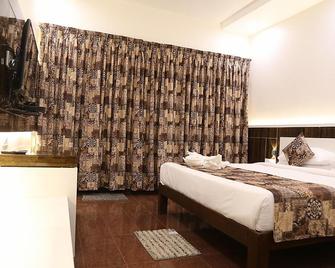 Hotel Pleasant Stay - Bijapur - Habitación