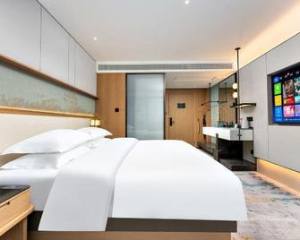 Seong nam Hotel ( Xiangyang Gucheng Branch) - Xiangyang - Bedroom