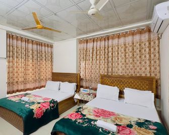 Hotel Labbaik Three Residential - Dhaka - Slaapkamer