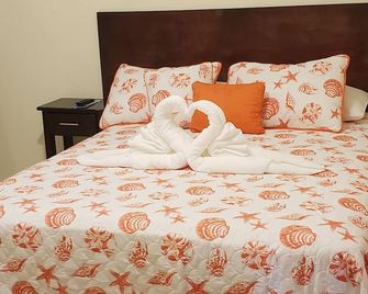 Sir Angel's Guesthouse - Cidade de Belize - Quarto