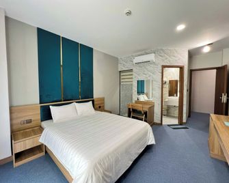 Tran Long District 12 - הו צ'י מין סיטי - חדר שינה