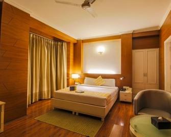 Treebo Tryst Check In by Oran - New Delhi - Bedroom
