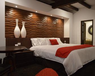 Radisson Hotel Tapatio Guadalajara - טלקפאקה - חדר שינה