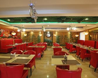 Divinity by Audra Hotels - Mathura - Ресторан