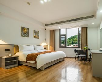Floral Hotel·Bibo yuan Hotel - Tongren - Habitación
