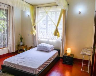 Lightness Boarding House - Arusha - Bedroom