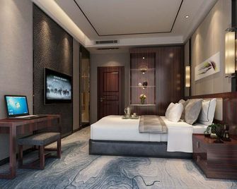 Hua Fang Hotel - Ji’an - Schlafzimmer