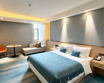 Ginkgo International Hotel (Yulin Museum Wanda Plaza Branch) - Yulin - Bedroom