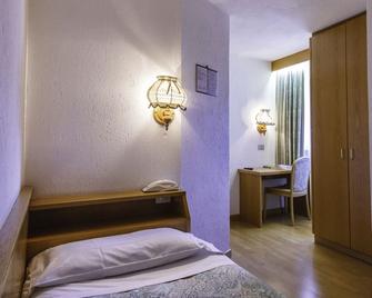 Hotel Ottoz Meublé - קורמאיור - חדר שינה