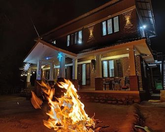 Discover a peaceful retreat nestled in the breathtaking mountains of Attapady, - 마나르카드 - 건물