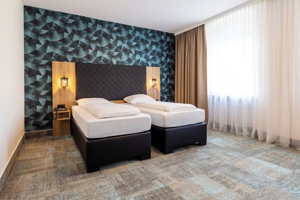 هوتل لينز - فولدا - غرفة نوم