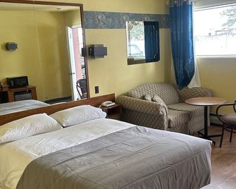 Motel R-100 - Brossard - Makuuhuone