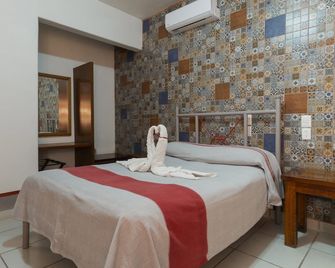 Hotel Posada el Cid - Oaxaca de Juárez - Habitación