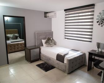 Hotel Roosevelt Plaza - Cali - Bedroom