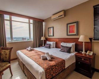 Emakhosini Hotel On East - Durban - Bedroom
