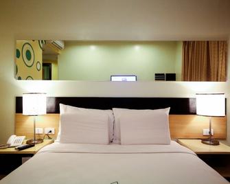 Go Hotels Iloilo - אילוילו סיטי - חדר שינה