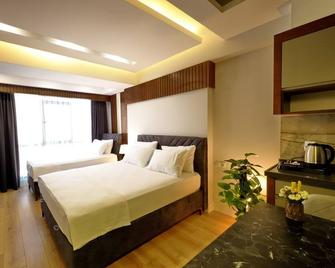 Falaylar Suit Hotel - Mardin - Schlafzimmer