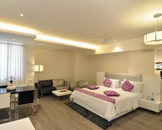 Hotel Vijay Parkinn Coimbatore - Coimbatore - Bedroom