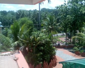Varsha International Residency - Kottayam