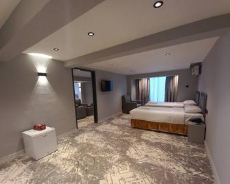 Sur Hotel - Sur - Bedroom