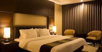 Grand Abe Hotel - Jayapura - Schlafzimmer