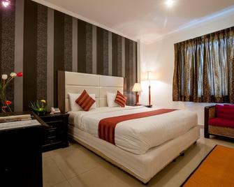 City Lodge Hotel - Phnom Penh - Bedroom